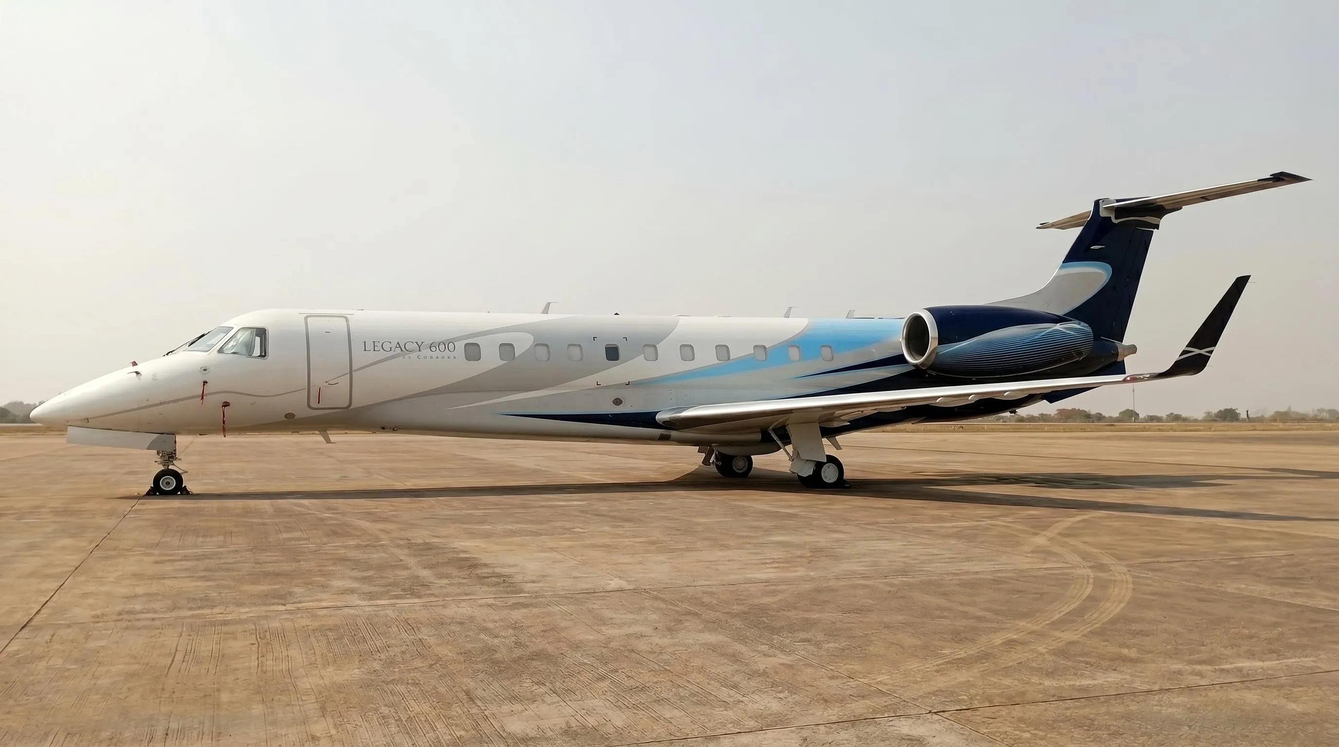 Dark private jet ready on runway