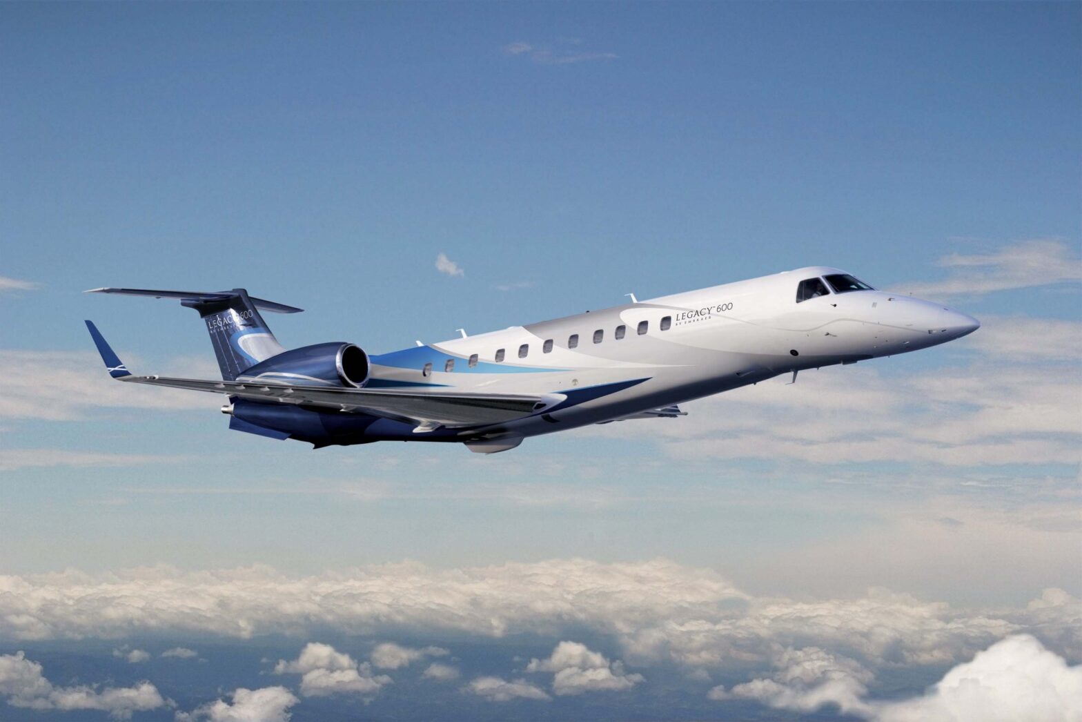 Legacy 600 flying in the sky | Operate by Air Kalinga